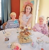 Ellie Ganson and Dorthy Keuper being served by Stephanie Knight.